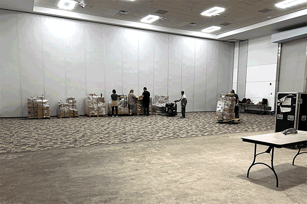 GIF of empty room getting filled with server racks